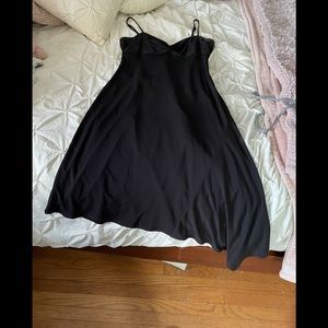 Black asymmetrical hem LBD.